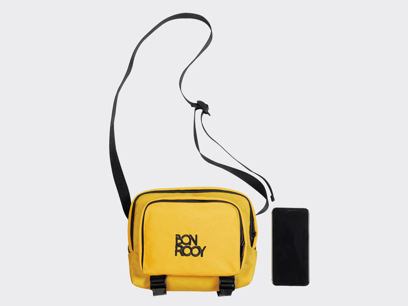 A yellow cross body bag.