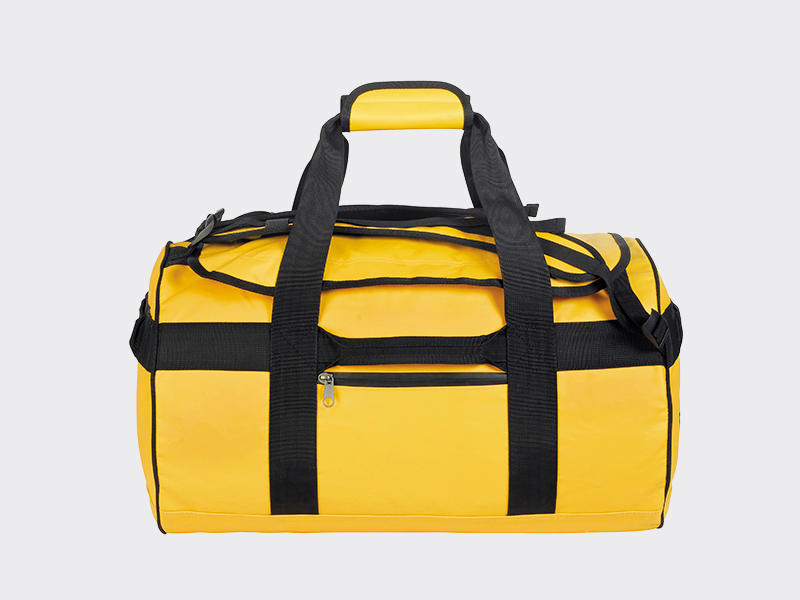 A yellow travel dufel bag.